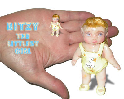 Bitzy the littlest girl fits on the palm of your hand like magic. Clay miniature.